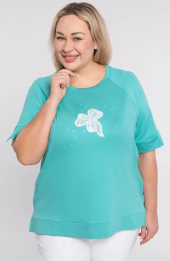 Jasnoniebieska bluzka z aplikacją